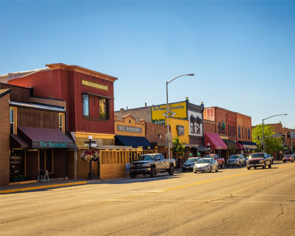 Kalispell Montana is a charming town that has an edgy old country vibe. Fresh and fantastic restaurants with great shops with a touch of old west flair.