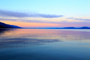 Flathead Lake Near Big Fork Montana at Sunset. Perfect for fishing, water skiing, tubing, sailing